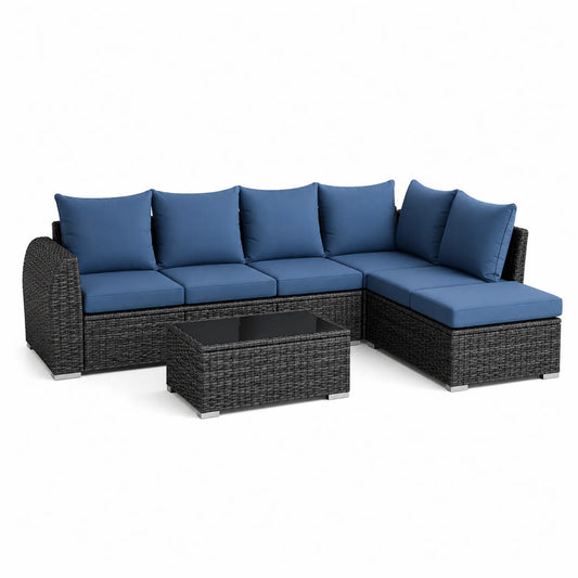 Eck-Gartensofa-Set aus Polyrattan mit dunkelblauen Kissen und Glasplatte